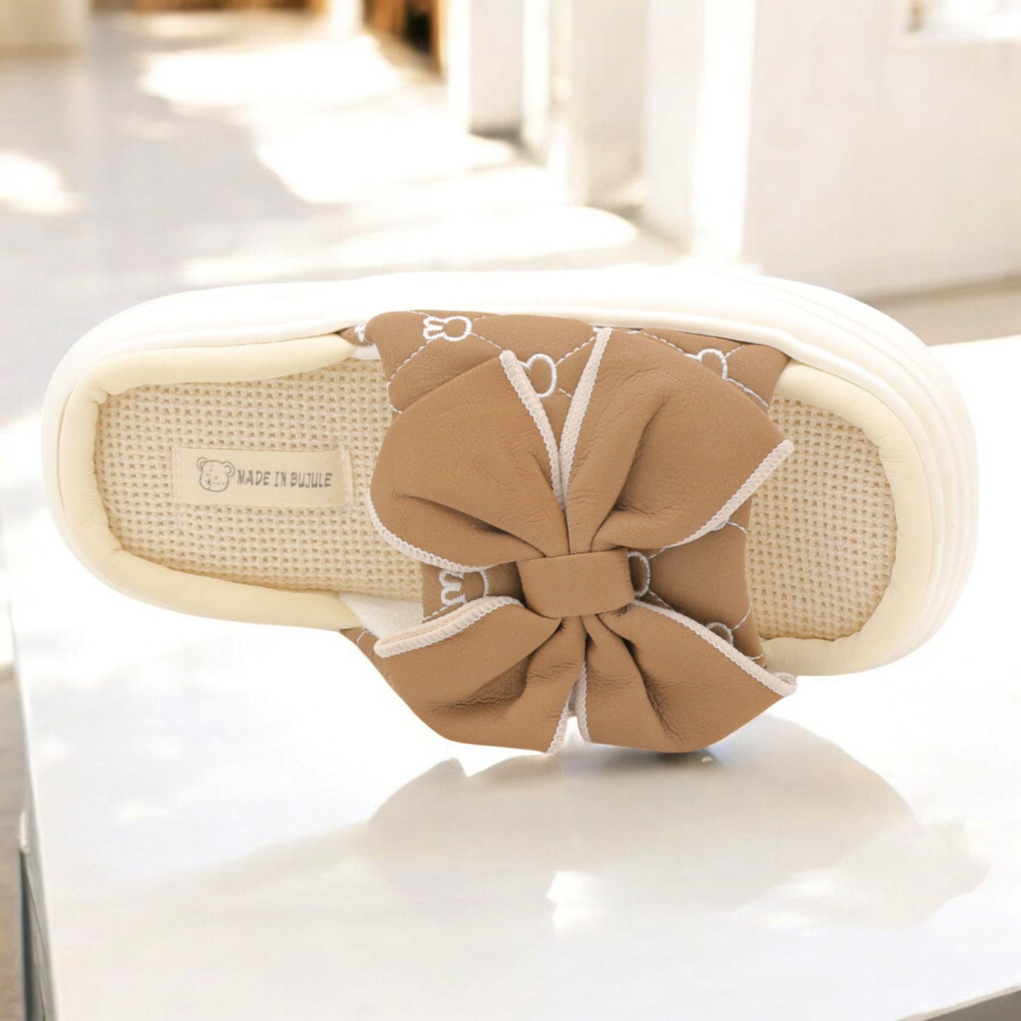 Alpha bow slipper